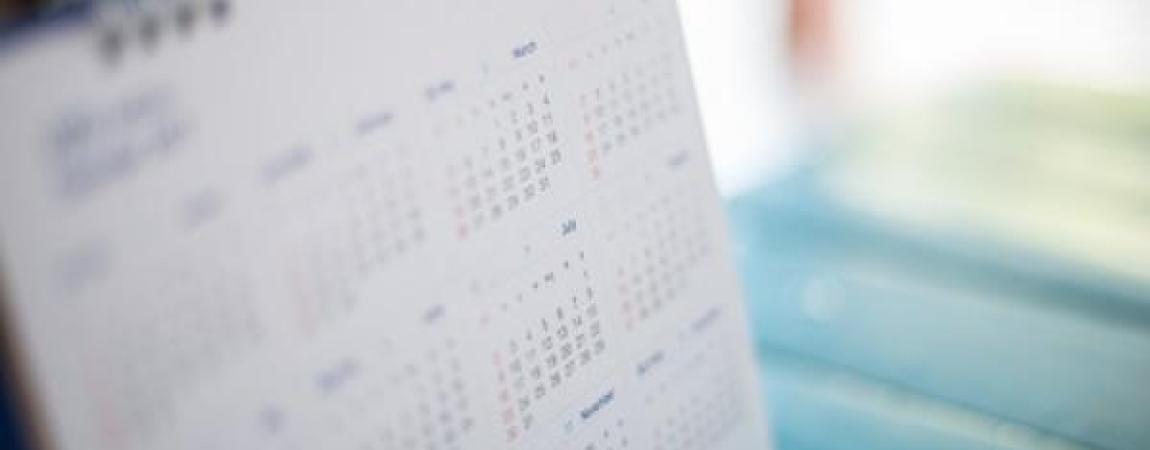 Calendar showing the year sitting on a table